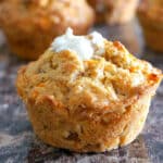 A carrot muffin on a table top