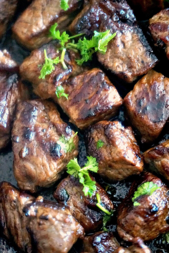 Close-up shoot of a pan with steak bites