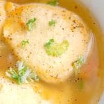 Close-up shoot of 2 semolina dumplings in a soup