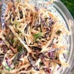 A glass bowl with coleslaw