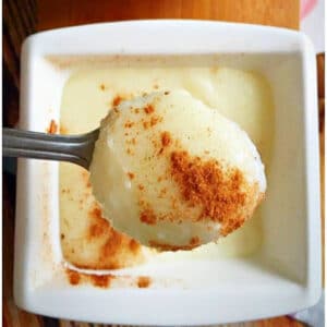 Close-up shoot of a white ramekin with semolina pudding