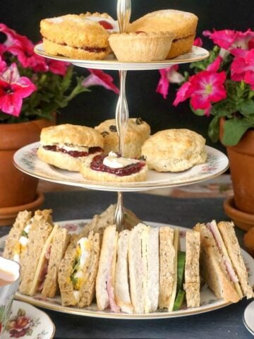 A 3-tiered cake stand with afternoon tea treats