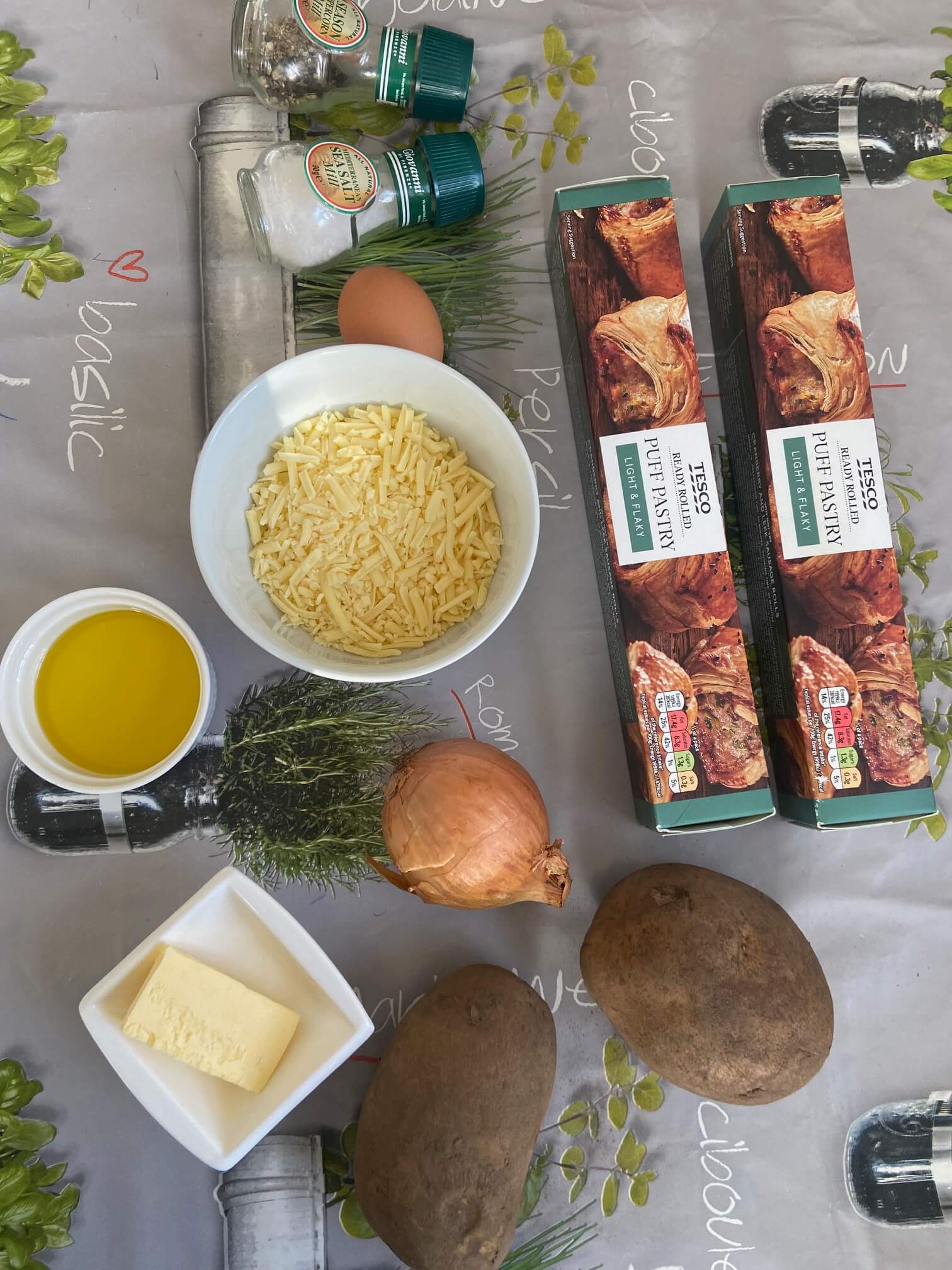 Ingredients needed to make potato, cheese and onion pasties.