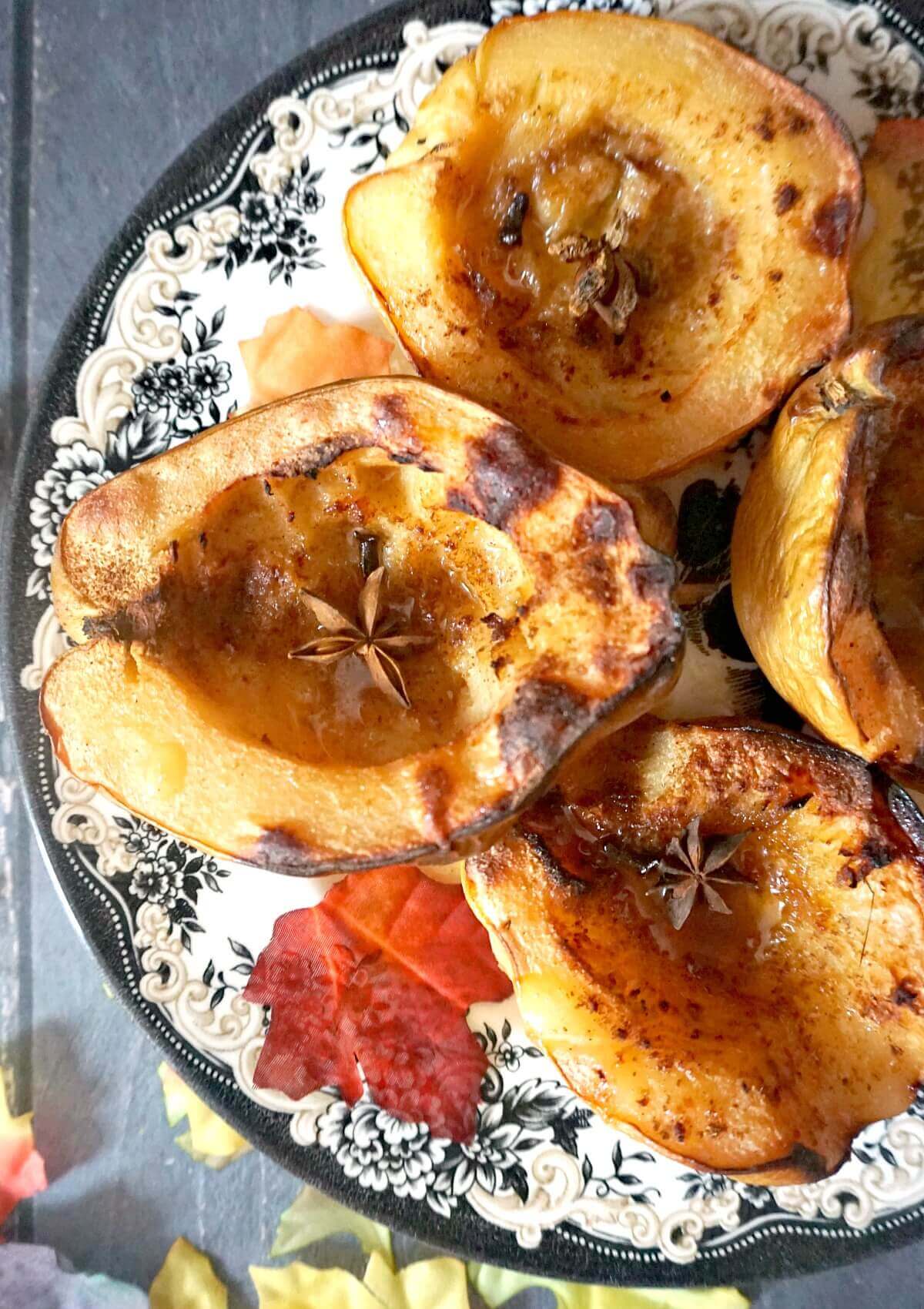 Overhead shoot of 4 quince halves on a plate