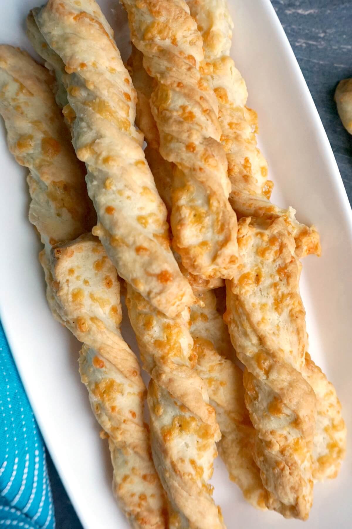 Overhead shoot of a white plate with cheese twists