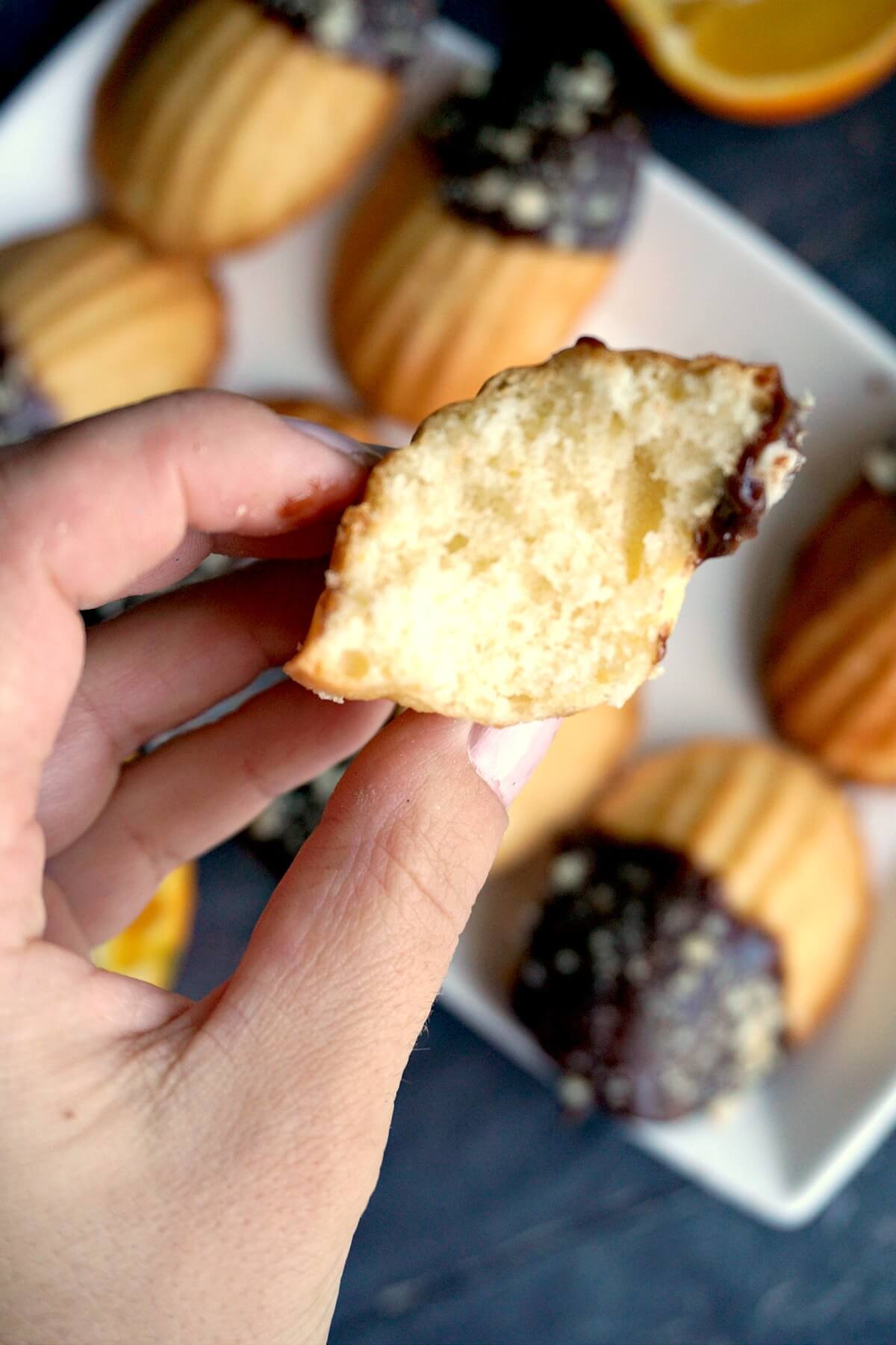 Half of a madeleine to show how fluffy it is inside.