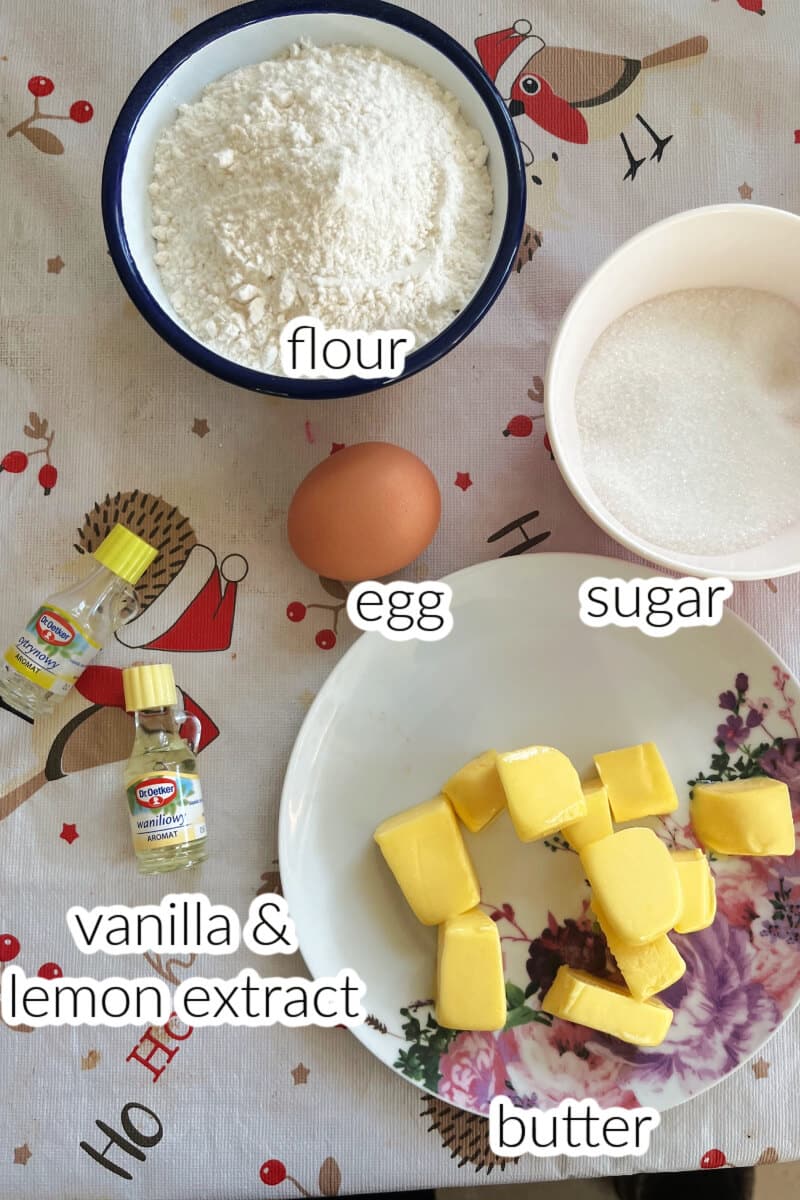 Ingredients needed to make stamped cookies.