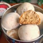 Half of a lebkuchen cookie on top of other whole cookies.