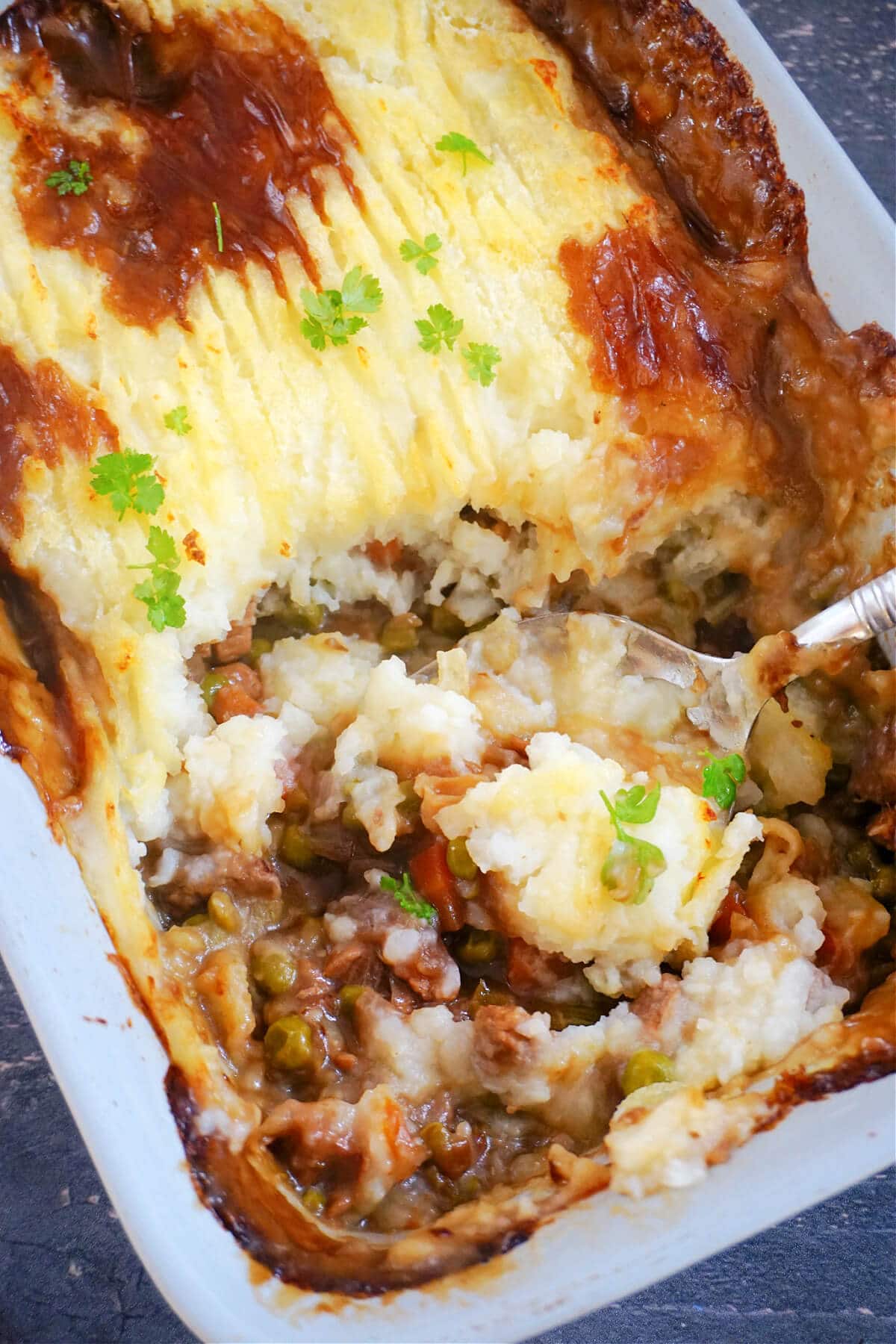 Overhead shot of a dish with leftover beef cottage pie.