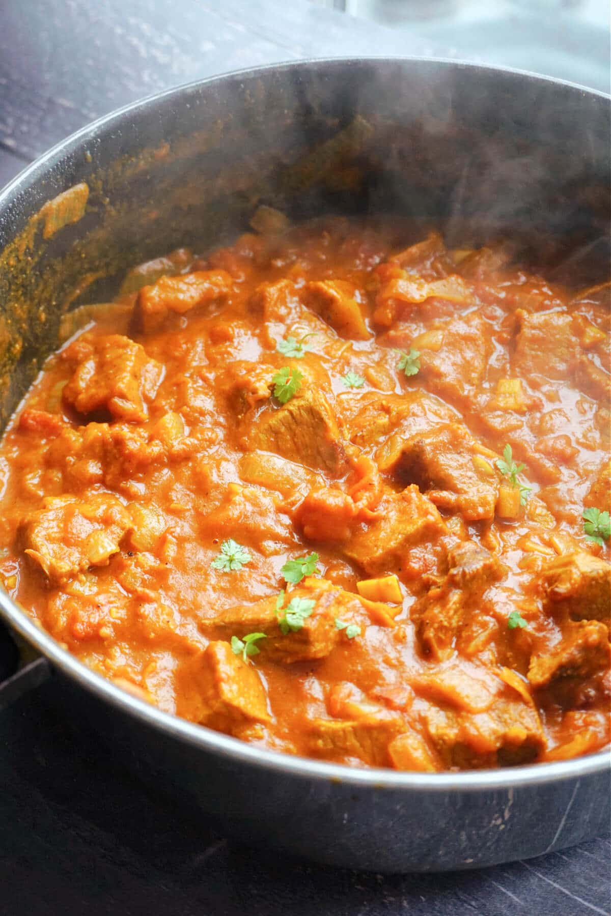 A pan with leftover beef curry.