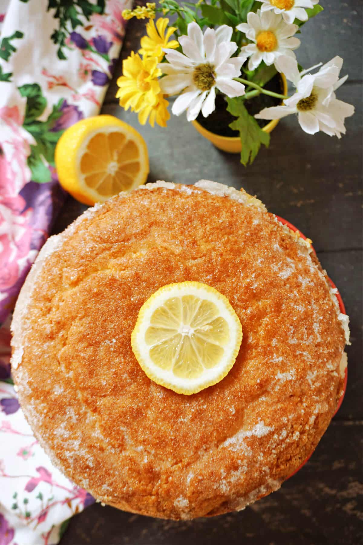 Overhead shoot of a cake with a lemon slice on top
