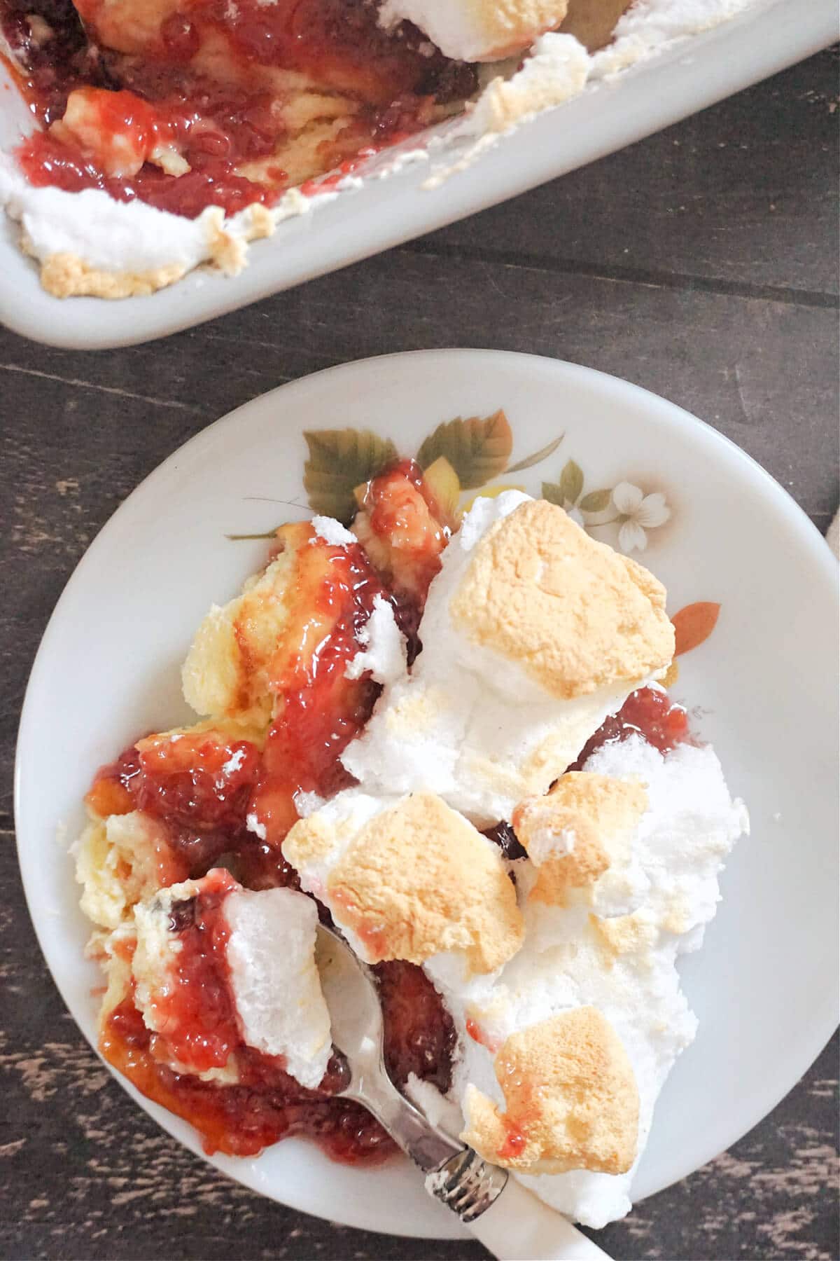 Overhead shot of a white plate with queen of pudding.