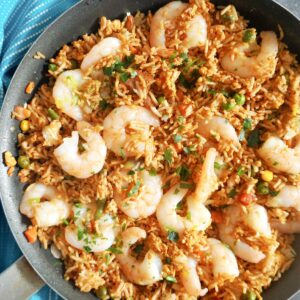 Overhead shot of a pan with fried rice and prawns