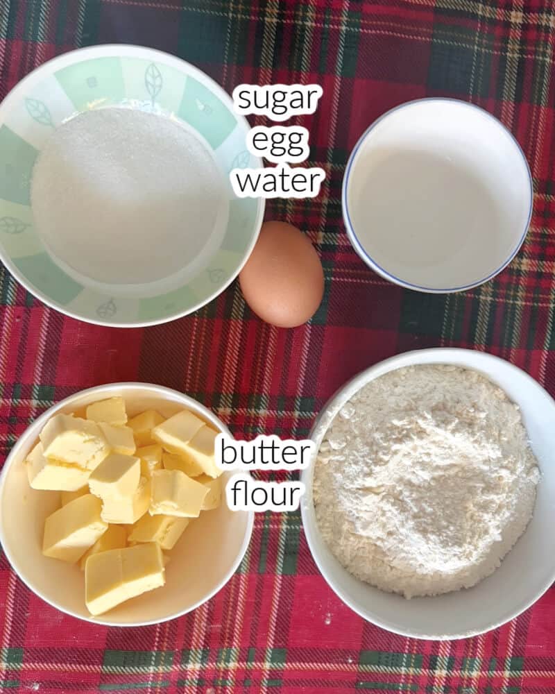Ingredients displayed for making sweet shortcrust pastry.