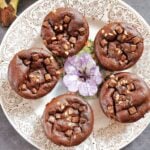 Overhead shot of a plate with 5 muffin-shaped brownies