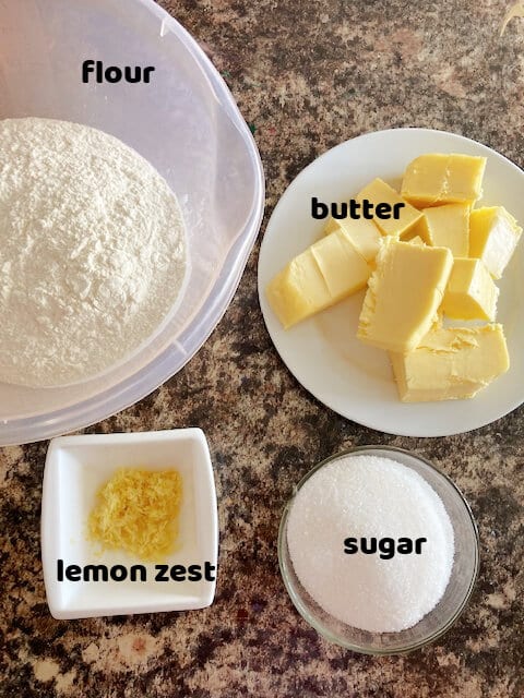 Overhead shot with ingredients needed for a blueberry crumb pie.