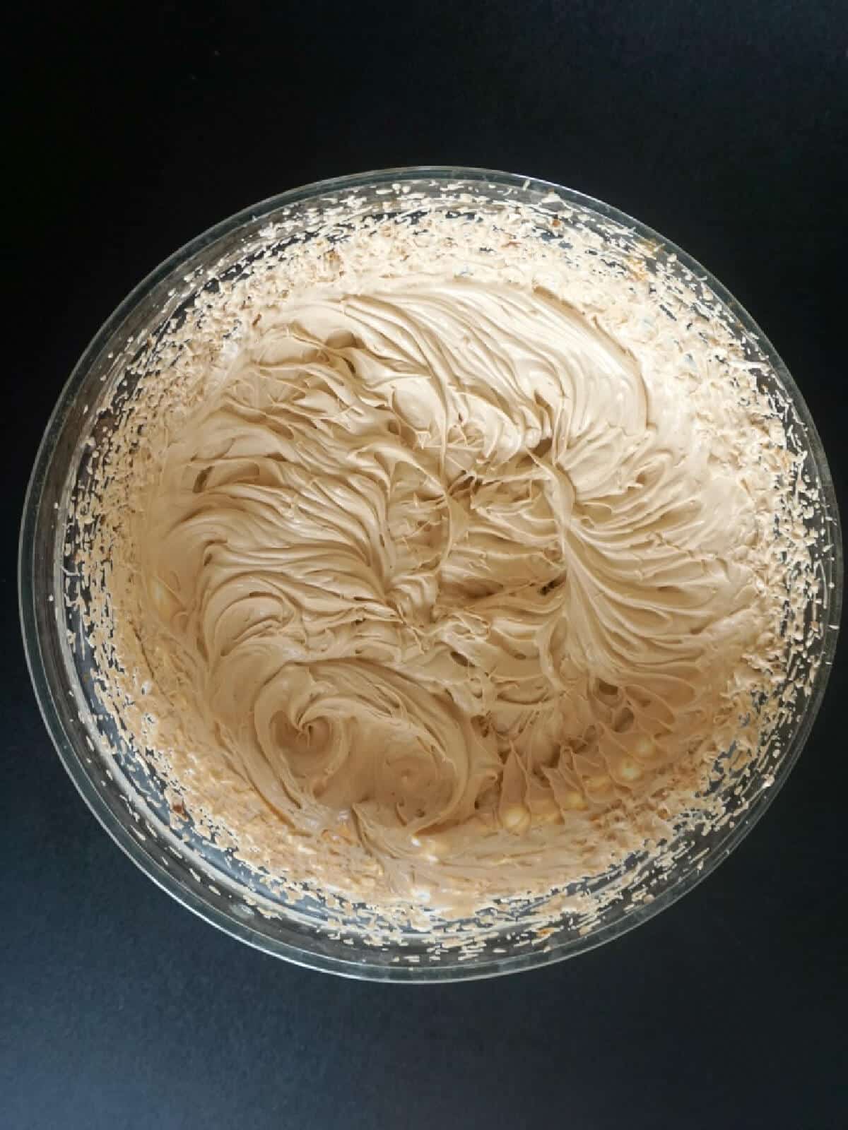 A bowl with coffee ice cream to be frozen.