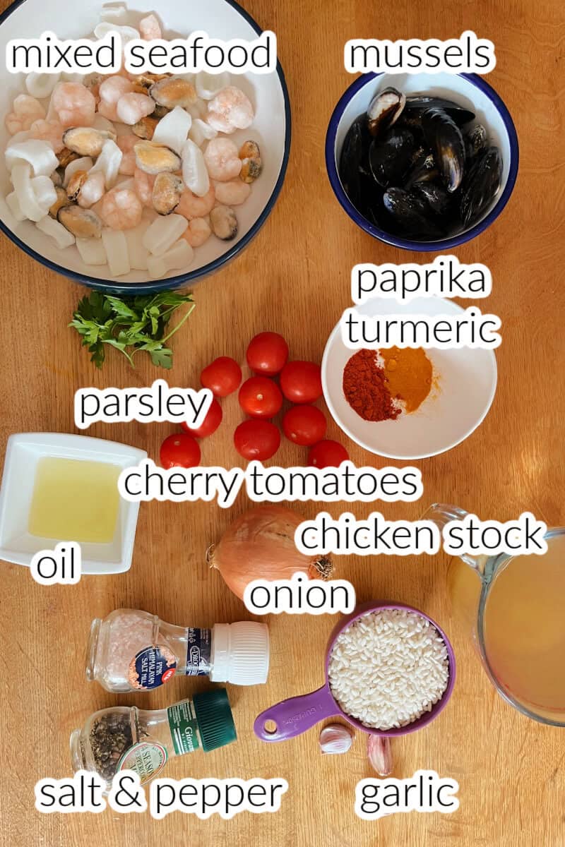 Ingredients used to make paella with seafood.