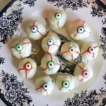 Overhead shoot of a plate with 12 eyeball truffles