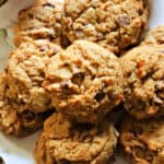 A plate with chocolate chip cookies.