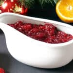A white bowl with cranberry sauce