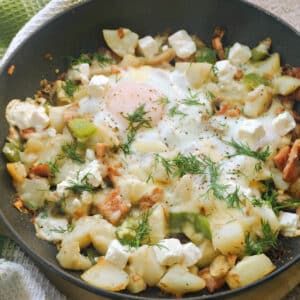 A pan with hash and eggs