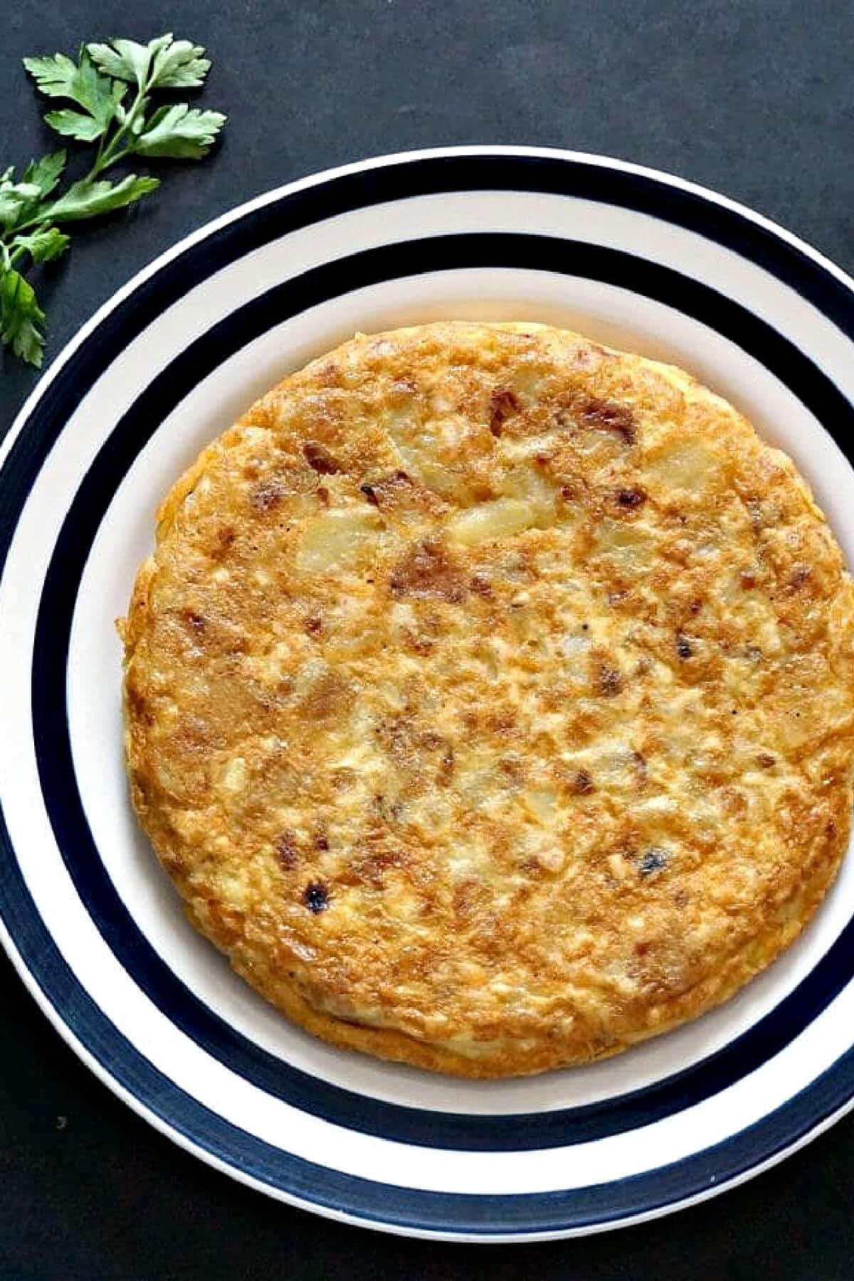 Overhead shoot of a plate with a potato omelette