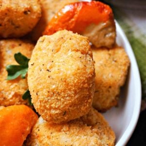 A white bowl with breaded scampi