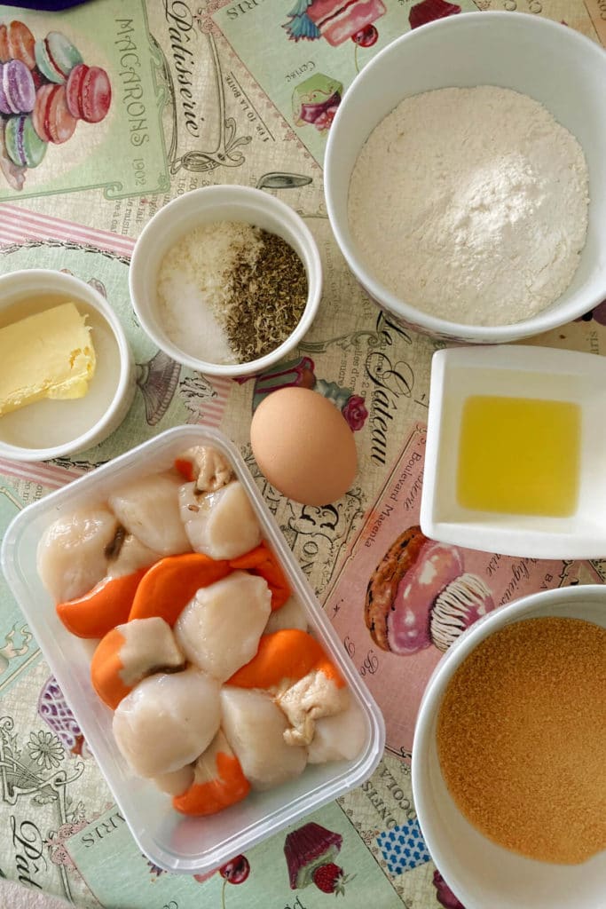 Overhead shoot of ingredients needed for making breaded scallops