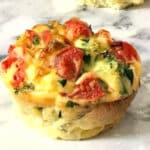 One egg muffin on a table top