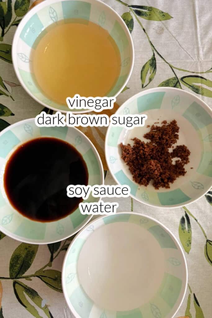 Ingredients displayed to make adobo sauce.