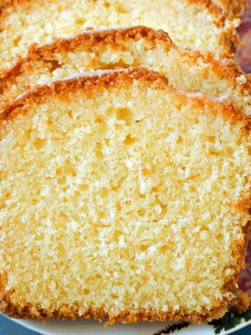 Close-up shoot of 4 slices of lemon and elderflower drizzle cake