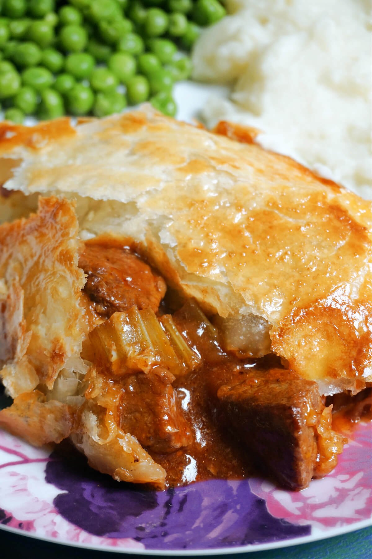 Close-up shoot of a steak pie slice.