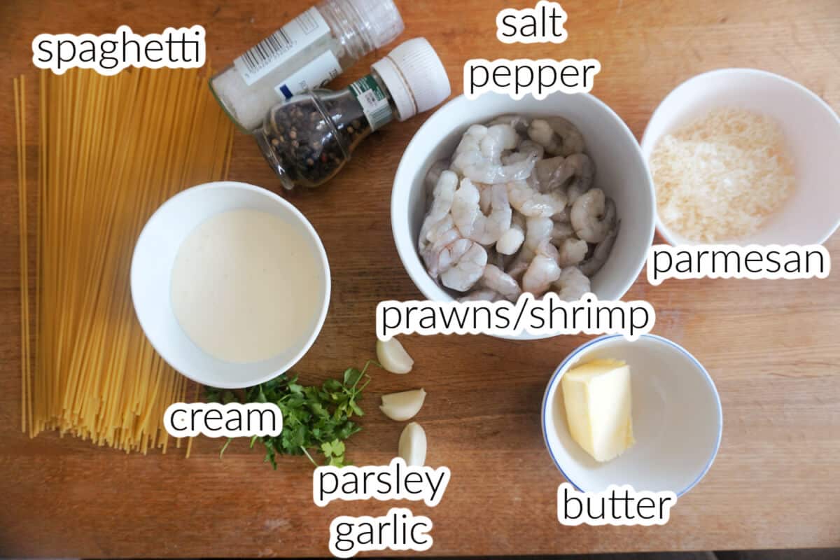 Ingredients used to make alfredo spaghetti with prawns.