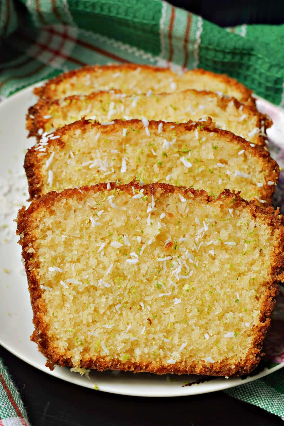 4 slices of cake on a white plate