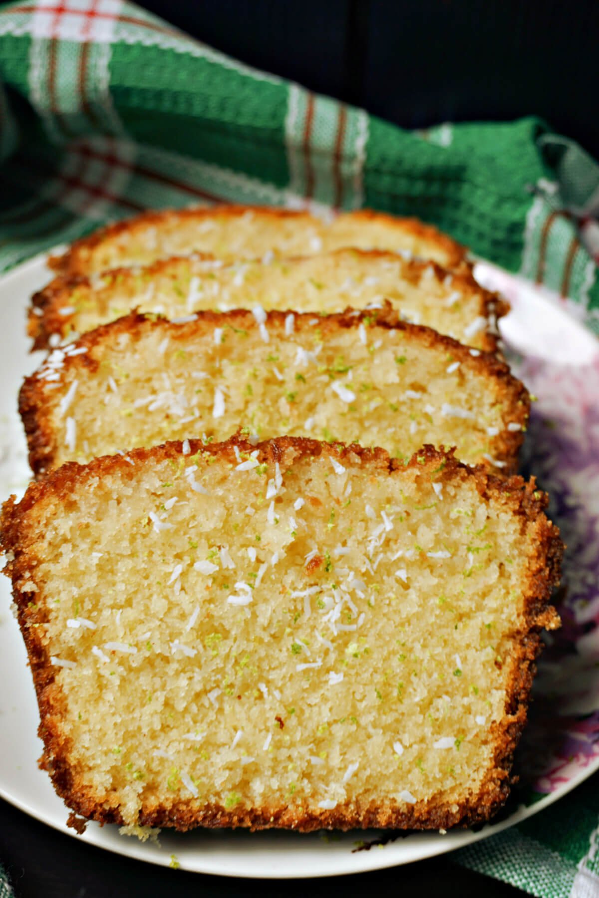 4 slices of lime cake on a white plate