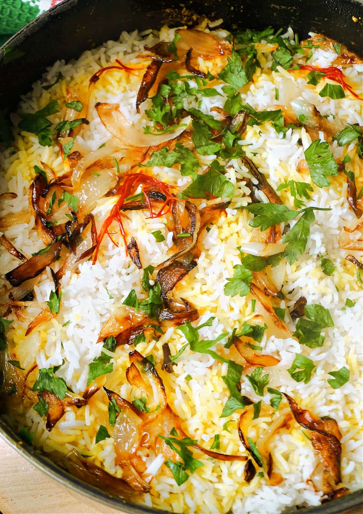 A pot with chicken biryani.