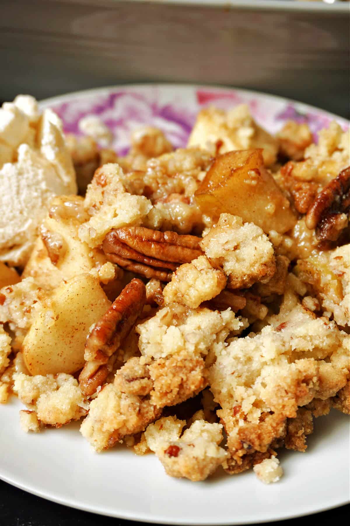 Close-up shoot of a pecan and apple crumble.