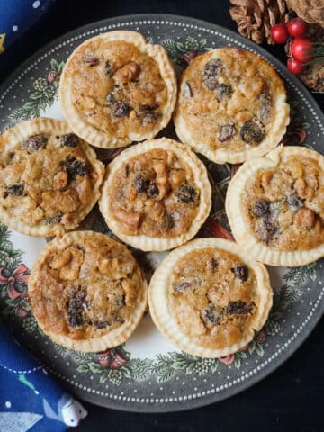 A plate with 7 ecclefechan tarts.