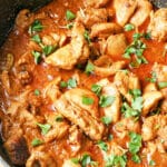 Close-up shoot of a pan with chicken masala.