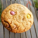 A chocolate egg cookie on a cooling rack.