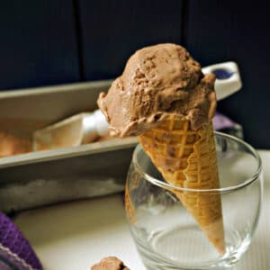 A cone with nutella ice cream in a glass.