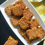 A white rectangle plate with flapjacks.