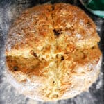 A round bread on a baking tray.