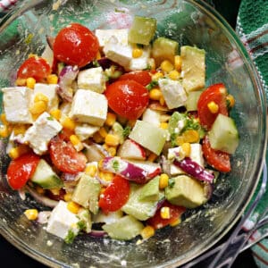 A glass bowl with salad.