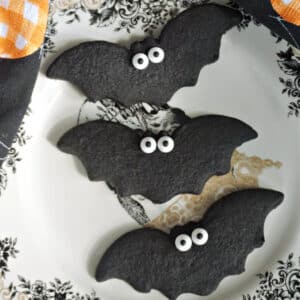 3 bat cookies on a Halloween plate.