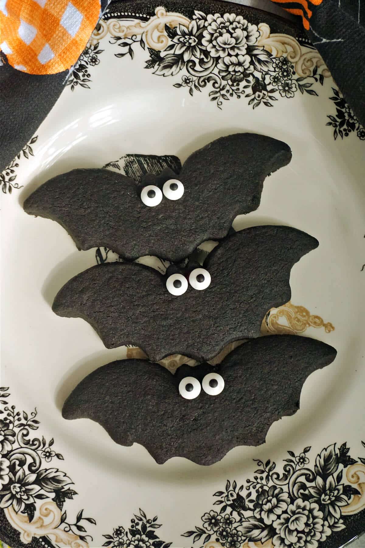 3 Halloween cookies in the shape of bats.