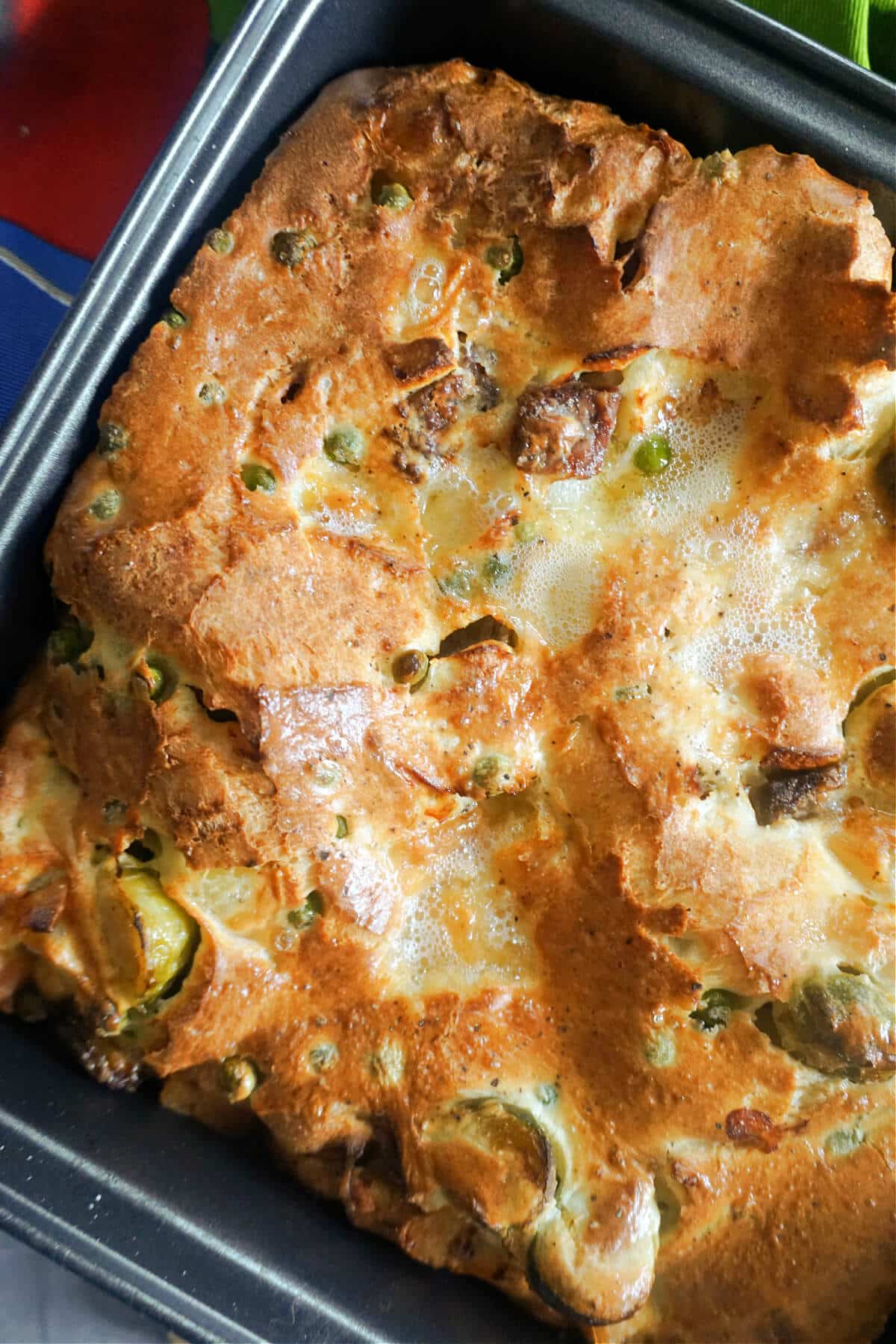 Close-up shoot of a square tray with toad in the hole.