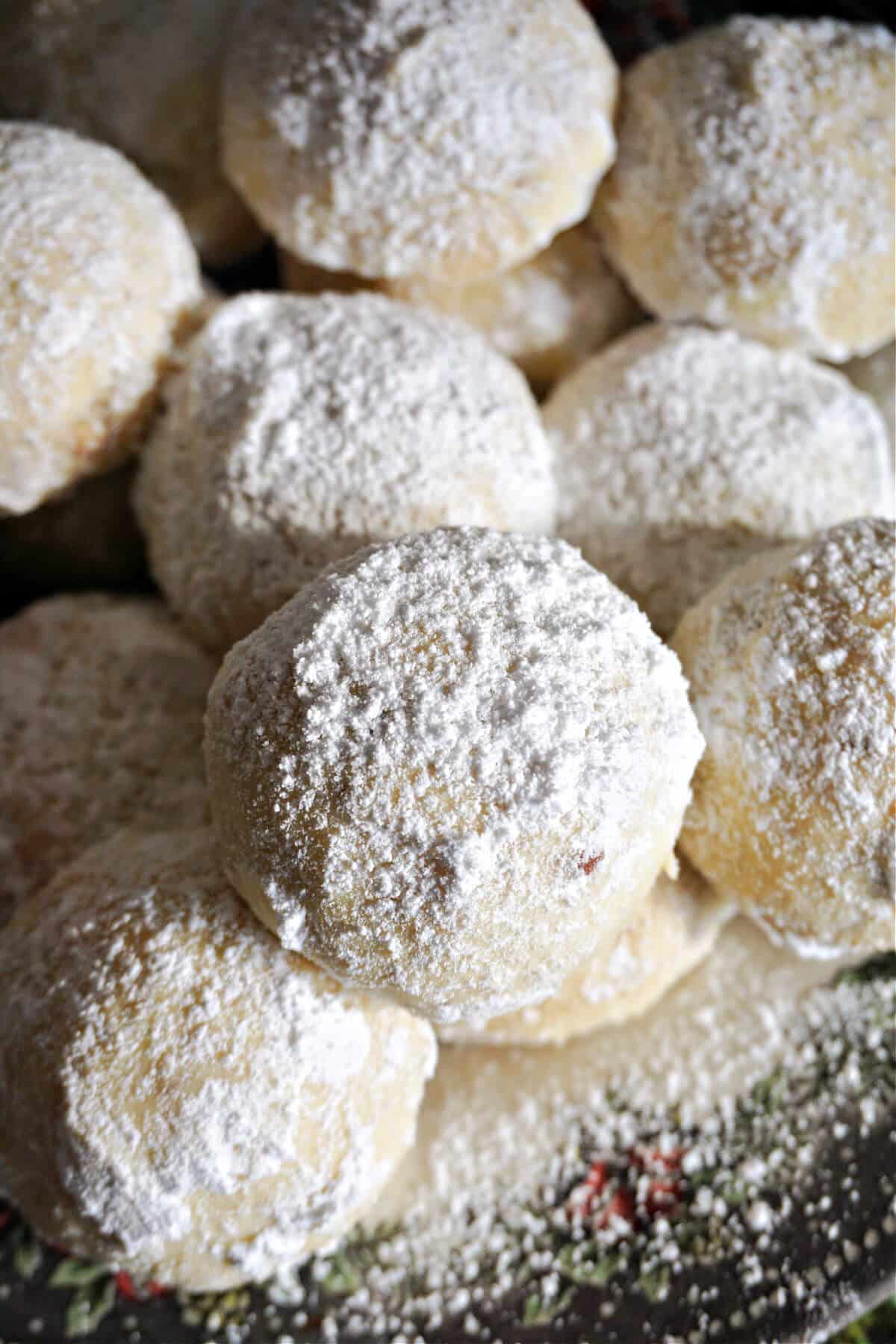 Close-up shoot of snowball cookies on a plate.