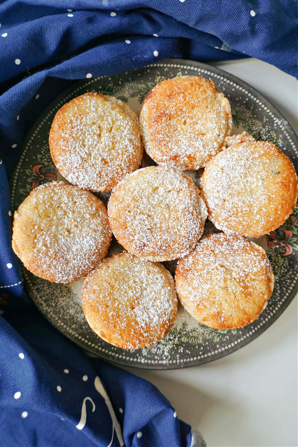 A plate with 7 frangipane mince pies.